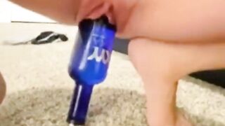 Tiny Teen Stretching her Pussy with a Huge Bottle.