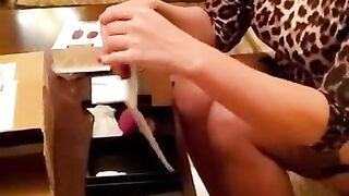 Sexy milf unboxing sex toy package from SVAKOM