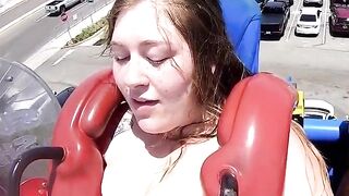 Huge cleavage on a theme park ride