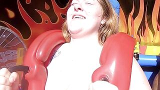 Huge cleavage on a theme park ride