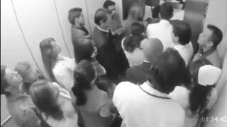 Doctor Gropes Nurse In Elevator Full Of People