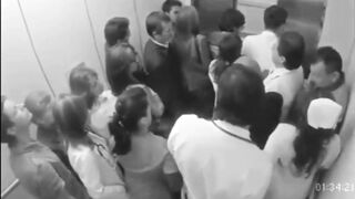 Doctor Gropes Nurse In Elevator Full Of People