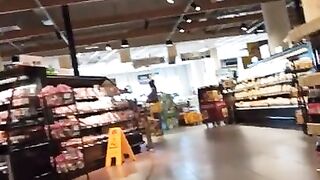 This girl loves to show her body in the supermarket