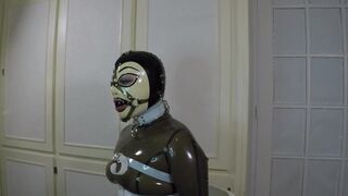 Trailer miss Maskerade Bound in Full Rubber Latex Catsuit