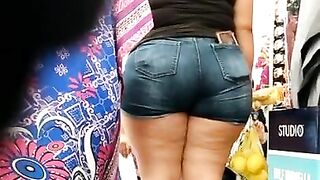 Mexican MILF thick ass and thighs in jeans VPL.