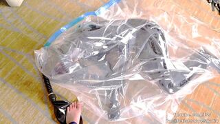 Cute Latex girl on vacuum bag and mask, breathplay