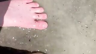 Feet Playing in a Puddle