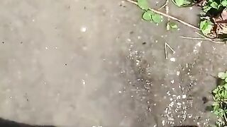 Feet Playing in a Puddle