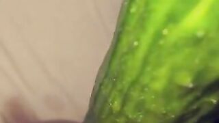 Swiss girl fucks herself with a cucumber