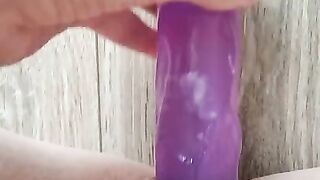 Pussy masturbating with purple dick