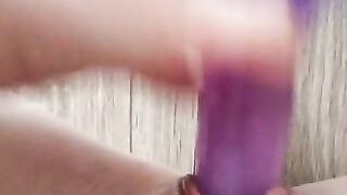 Pussy masturbating with purple dick