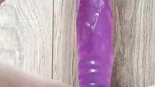 Pussy masturbating with purple dick