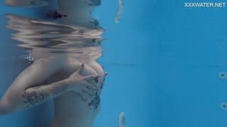 Cute blonde Finnish pornstar Mimi Cica underwater