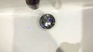 Shooting my cum in to the hotel sink