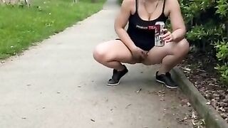 Walking with anal plug and piss on the path