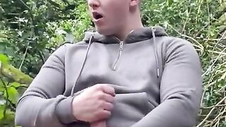 Jock jerks his cock in Forrest