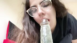 Brunette teen sucks her dildo like a real dick