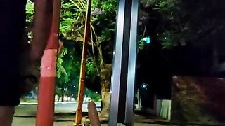 Sissy slut sitting on a huge dildo in public bus station at night while cars pass by