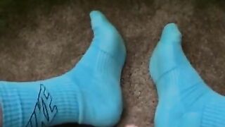 Bate in blue Nike socks