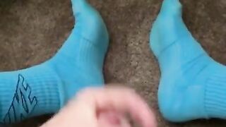 Bate in blue Nike socks