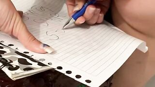 Arab writing the name with a pencil in the ass