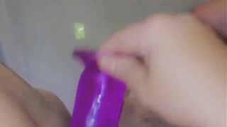 Putting my purple dildo deep inside my hungry pussy