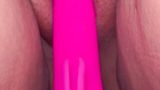 Red nails holding pussy with a vibration for orgasm