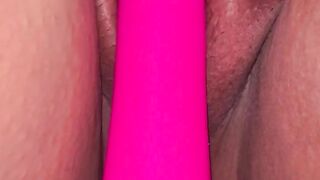 Red nails holding pussy with a vibration for orgasm