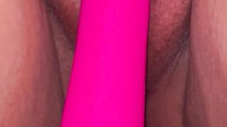 Red nails holding pussy with a vibration for orgasm