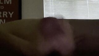 Thick cock gets jerked off until a cumshot